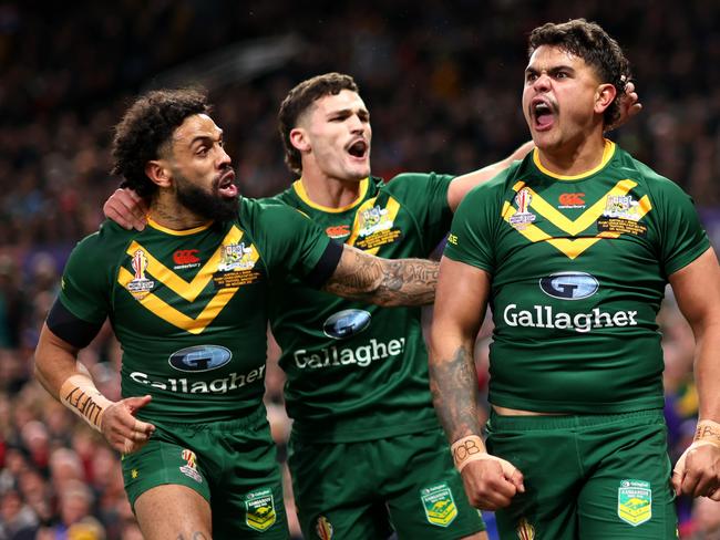 MANCHESTER, ENGLAND - NOVEMBER 19: Latrell Mitchell of Australia celebrates their sides first try with teammates during the Rugby League World Cup Final match between Australia and Samoa at Old Trafford on November 19, 2022 in Manchester, England. (Photo by Naomi Baker/Getty Images)