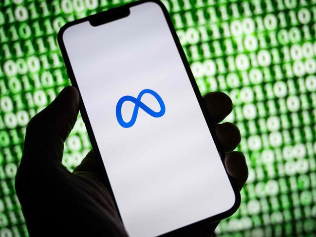 (FILES) This illustration photo taken on October 30, 2023, shows the Meta (former Facebook) logo on a smartphone in Mulhouse, eastern France. Tech giant Meta on December 7, 2023, was rolling out long-promised end-to-end encryption of chats and calls at Messenger and Facebook. Ramped up defenses against snooping that include disappearing messages come as the US company defends against lawsuits accusing it of being misleading about safety at its family of apps and of being a 
