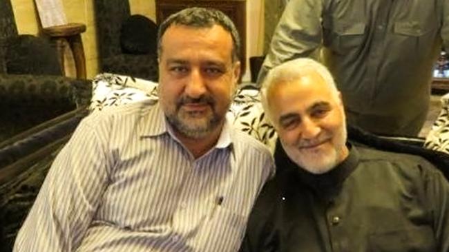 Razi Moussavi, a senior adviser for Iran's Islamic Revolutionary Guard Corps (IRGC), sitting alongside the slain commander of the IRGC's Quds Force Qasem Soleimani, who was killed by a US drone strike in Iraq in 2020. Picture: Tasnim News / AFP