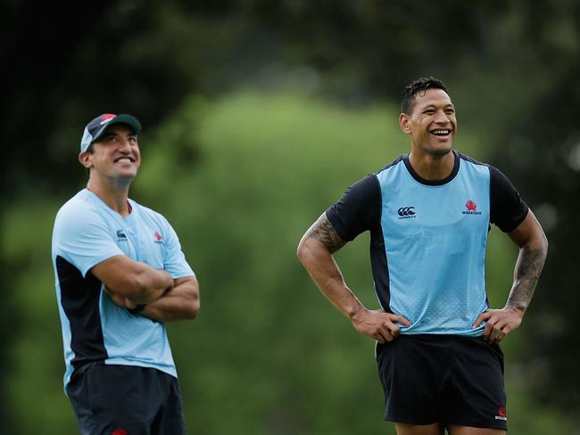 Coach Daryl Gibson says the Waratahs’ Wallabies are feeling the heat from the club’s rookies.