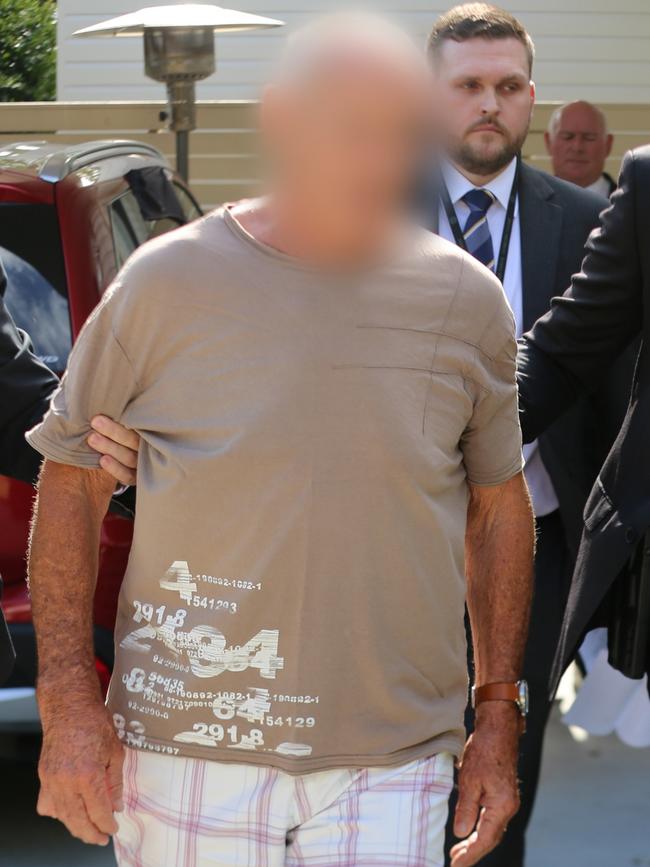 Chris Dawson is arrested in Queensland on Wednesday. Picture: NSW Police