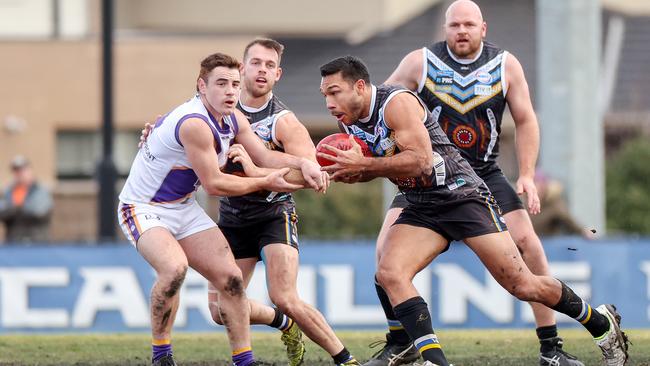 WRFL: Caroline Springs’ Joshua Cubillo breaks from the centre. Picture: George Salpigtidis