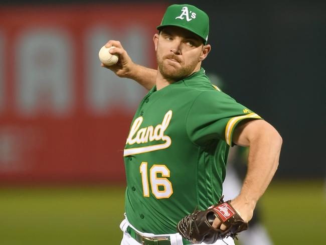 OAKLAND, CA - SEPTEMBER 21: Liam Hendriks #16 of the Oakland Athletics pitches against the Minnesota Twins in the top of the first inning at Oakland Alameda Coliseum on September 21, 2018 in Oakland, California.   Thearon W. Henderson/Getty Images/AFP == FOR NEWSPAPERS, INTERNET, TELCOS & TELEVISION USE ONLY ==