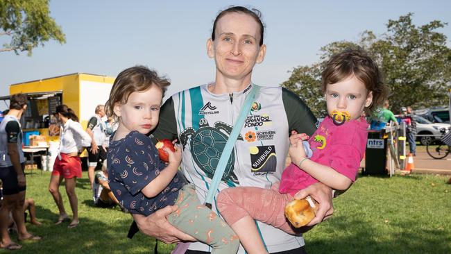 Camilla Wells with her twins Maggie ,2 and Molly ,2 was the fastest woman to finish the 22km on a cargo bike with her kids Maggie (2) and Molly (2) and Pippa (5) at the NTRS Top End Short Fondo 2023, Darwin. Picture: Pema Tamang Pakhrin