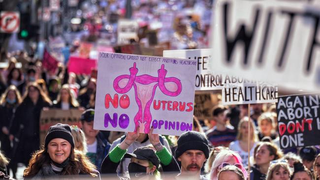 People marching through the streets of Melbourne. Picture: Luis Enrique Ascu