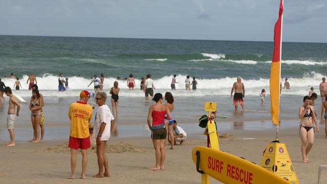 Blue bottles wash in on Southport beach.