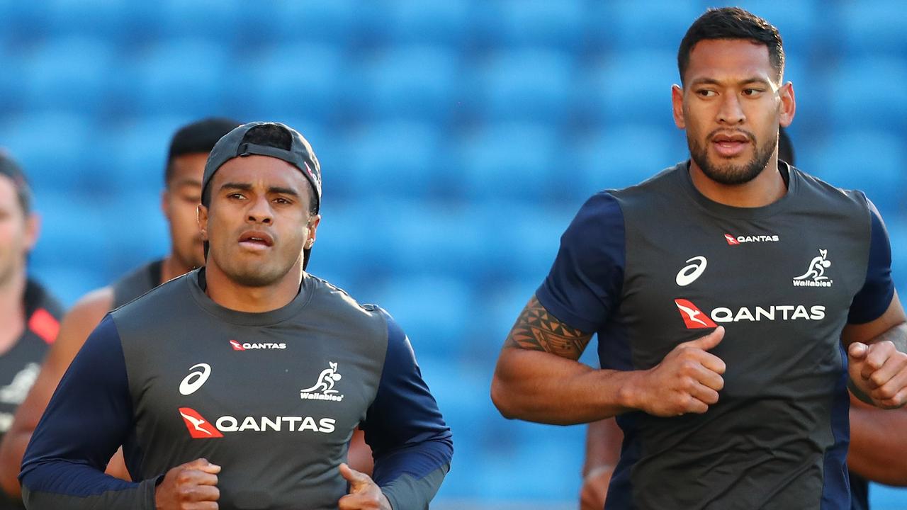 Will Genia and Israel Folau run during a Wallabies training session.