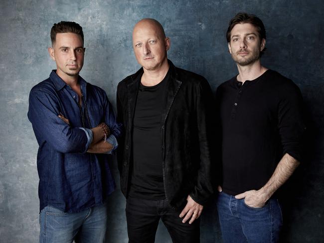 Wade Robson, from left, director Dan Reed and James Safechuck pose for a portrait to promote the film Leaving Neverland during the Sundance Film Festival. Picture: AP