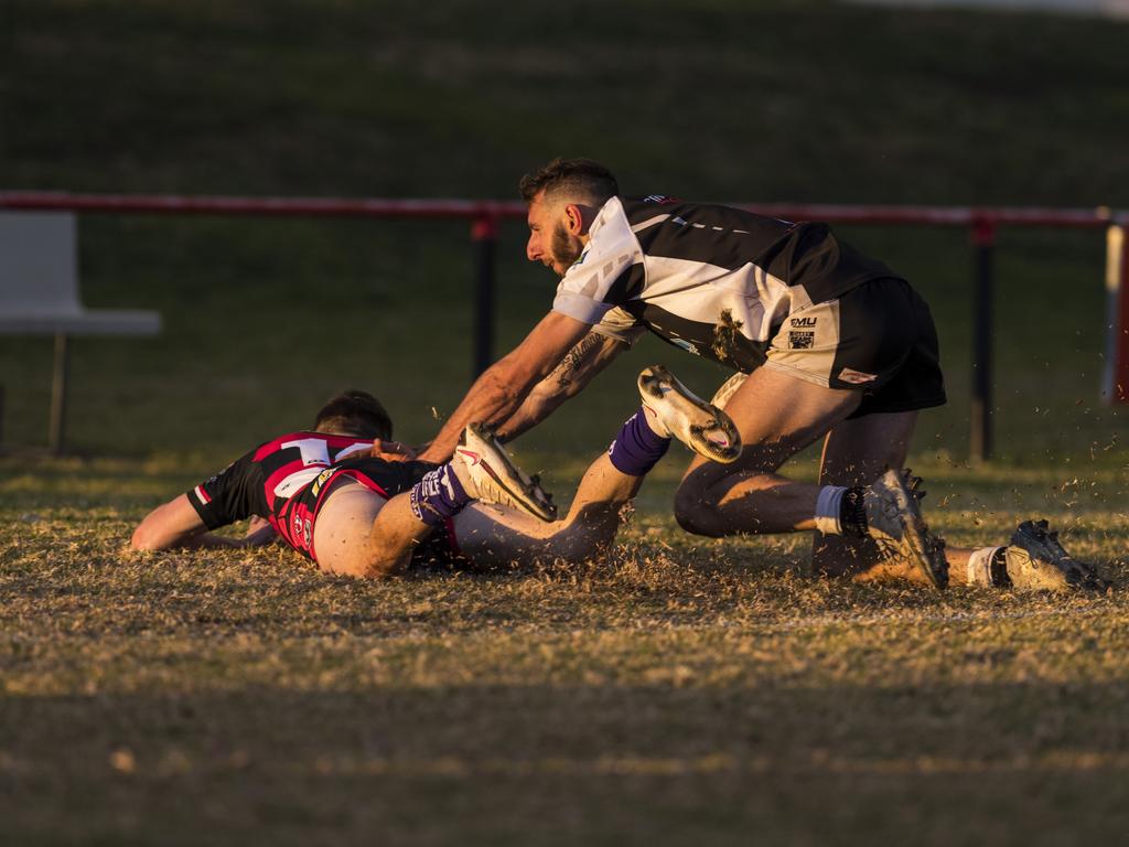Harrison Burns gets over to try for Valleys under pressure from Dylan Adamson of Oakey in TRL A grade round 10 rugby league at Herb Steinohrt Oval, Sunday, June 20, 2021. Picture: Kevin Farmer