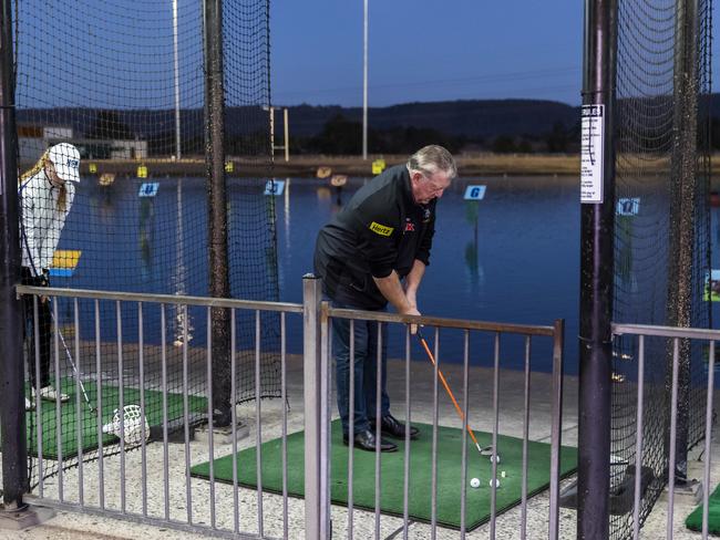 Panthers general manager Phil Gould tries his hand at Aqua Golf with $10,000 hanging on  every “hole-in-one”. Pictures: Penrith Panthers.