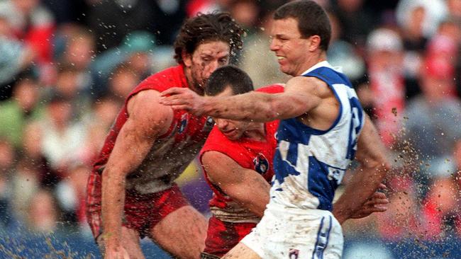 John Blakey in action for North Melbourne against the Swans during his playing career.