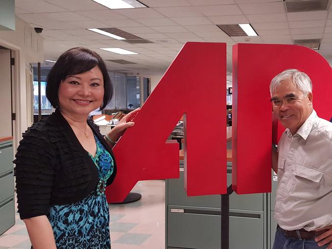 Kim Phuc reunited with Nick Ut at the Los Angeles bureau of the Associated Press, June 27, 2016. (AP Photo/Linda Deutsch)