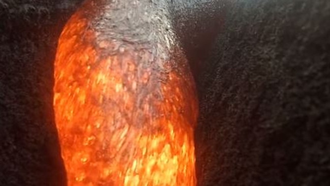 The footage shows the molten lava making its way down towards where the camera was sitting in a crevice between to rocks. Picture: Erik Storm/YouTube