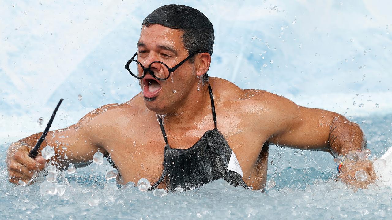 Jeff Farmer reacts after his plunge into the icy waters. Picture: Michael Willson/AFL Photos