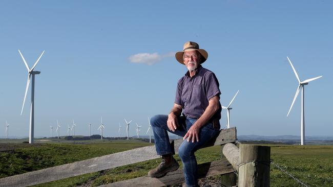 Don Fairbrother next to windturbines near his property in South Gippsland where residents are impacted by the Bald Hill wind farm. Picture: David Geraghty.