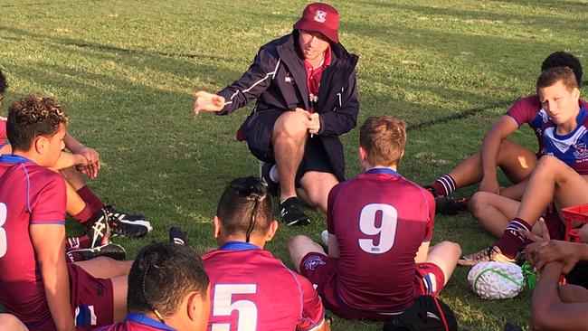 Wavell SHS coach and teacher Guy Williams addresses his players at Marsden.