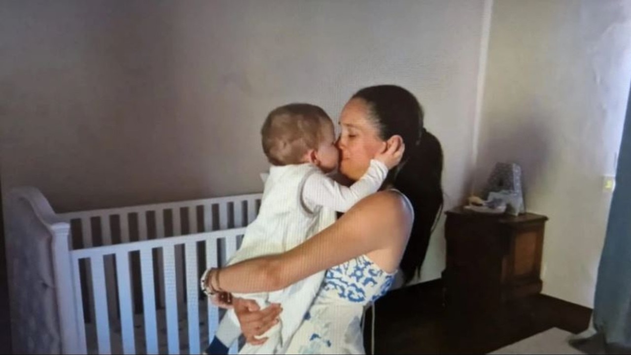 In one adorable snap, Meghan is seen holding son Archie closely as the tot holds her ear.