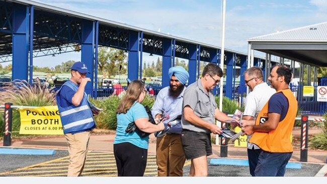 Labor candidate Sim Singh-Mahli hands out how to vote cards at the last state election. Picture: Murray Pioneer