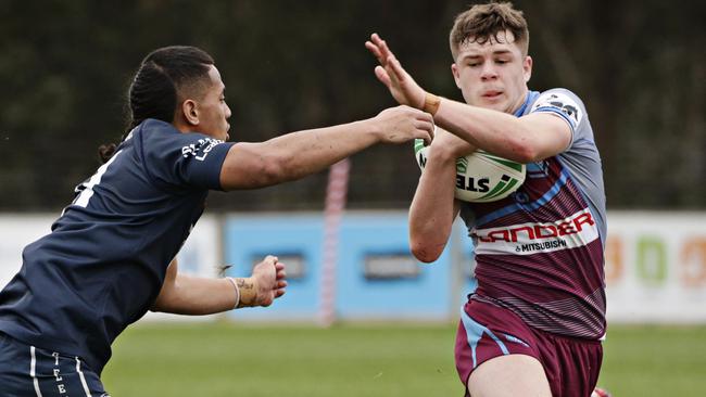 Blake Metcalfe from \Hills Sports High school making a break against Chifley College. Picture: Adam Yip