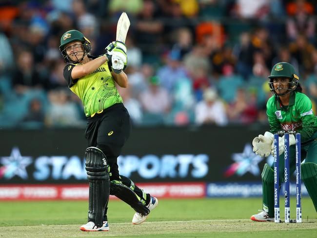 CANBERRA, AUSTRALIA - FEBRUARY 27: Alyssa Healy of Australia bats during the ICC Women's T20 Cricket World Cup match between Australia and Bangaldesh at Manuka Oval on February 27, 2020 in Canberra, Australia. (Photo by Cameron Spencer/Getty Images)