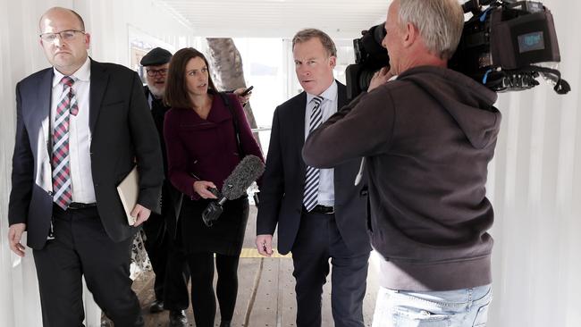 Premier Will Hodgman took the long way round as he tried to avoid the media on his walk from the Executive Building back to Parliament House. Picture: RICHARD JUPE