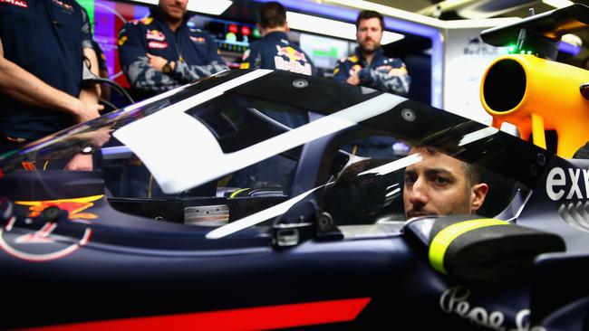 Daniel Ricciardo of Australia and Red Bull Racing sits in his Red Bull Racing Red Bull-TAG Heuer RB12 TAG Heuer fitted with the aeroscreen.