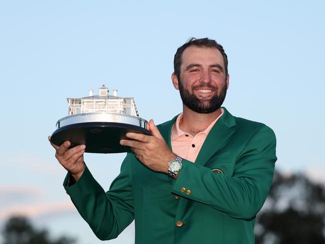 AUGUSTA, GEORGIA - APRIL 14: Scottie Scheffler of the United States poses with the Masters trophy after winning the 2024 Masters Tournament at Augusta National Golf Club on April 14, 2024 in Augusta, Georgia. (Photo by Warren Little/Getty Images)