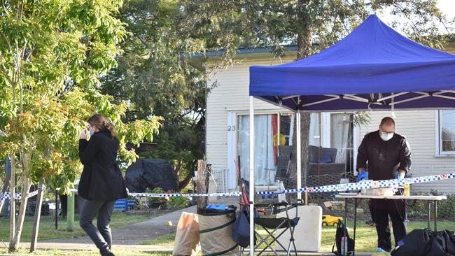 Forensics officers on scene on Sunday afternoon after 38-year-old Christopher Anderson was shot dead outside his home on Old Logan Rd, Gailes. Photo: Ebony Graveur