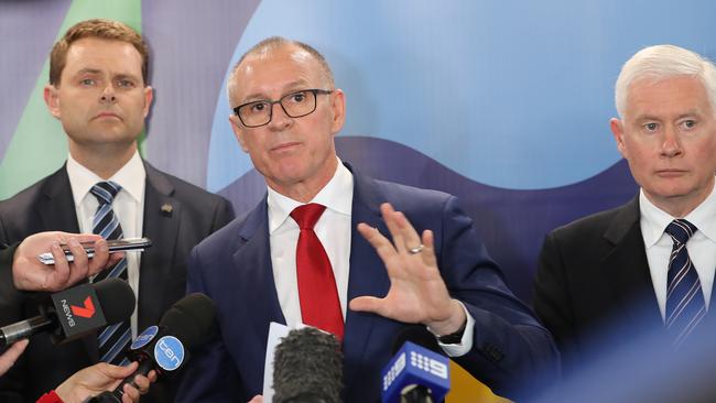 Premier Jay Weatherill, Minister Steven Mulligan and Deputy Premier John Rau at a press conference on Tuesday morning. Picture: Dylan Coker