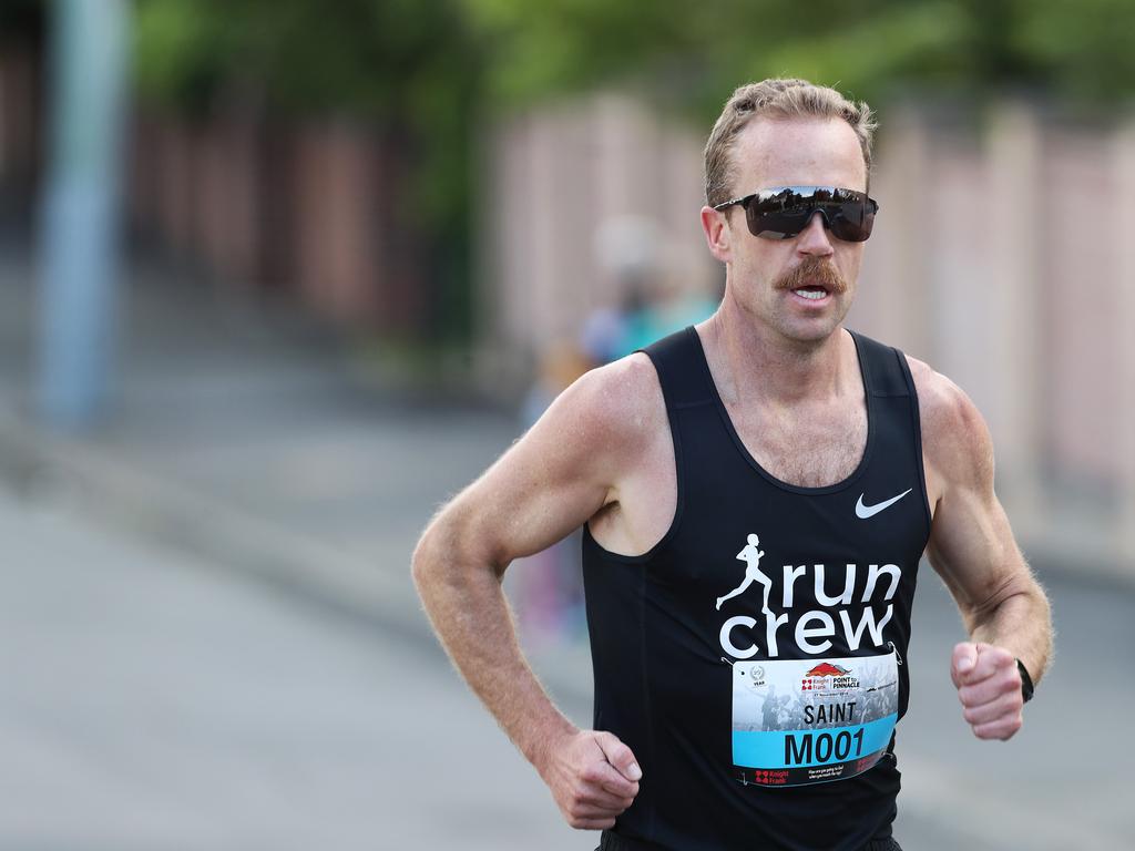 2018 winner Ben St Lawrence has a commanding lead early in the 2019 Point to Pinnacle as runners make their way up Davey Street. Picture: LUKE BOWDEN