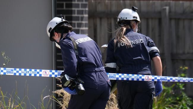 Forensic police comb for clues. Picture: Luis Enrique Ascui