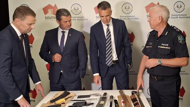 Caption: Premier Peter Malinauskas, Attorney General Kyam Maher, Treasurer of South Australia Stephen Mullighan and Police commissioner Grant Stevens discussing the proposed new laws to tackle knife crime, set to be introduced to parliament this week.