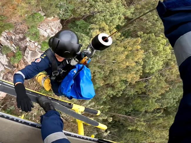 Winched man from bush after fall at Glastonbury, RACQ LIFEFLIGHT