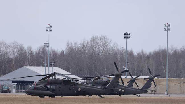 US Army Black Hawk helicopters on standby at an airfield near Mielec, Poland. Targeting NATO’s arms supply line into Ukraine from Poland would be a high-risk move for Moscow. Picture: Getty Images