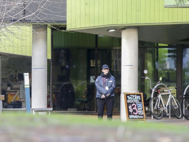 A security guard outside the safe injecting room. Picture: Wayne Taylor.