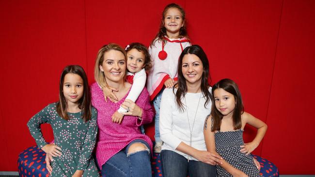 Podcasters and friends Rachel Thaiday, Katie Mattin and their children. Picture: AAP/Claudia Baxter