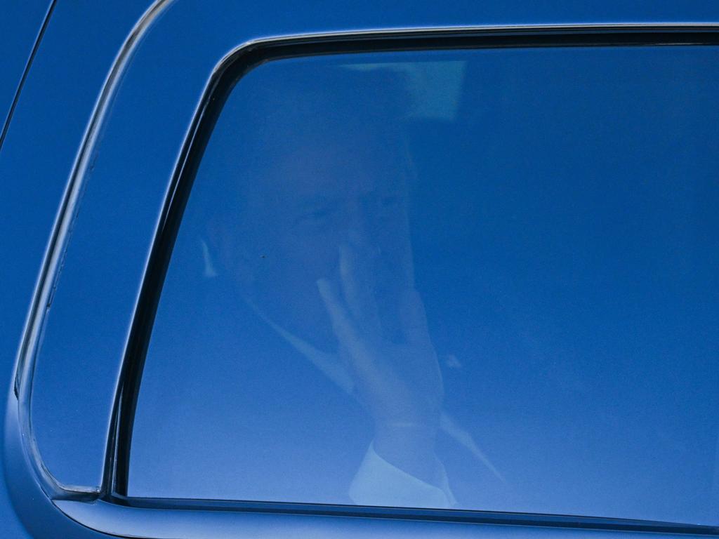 US President-elect Donald Trump waves to his supporters as he departs from his residence Mar-a-Lago Club in Palm Beach, Florida, bound for Washington DC. Picture: AFP