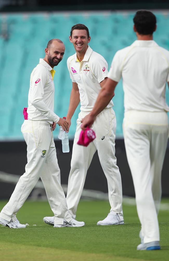 Nathan Lyon, Josh Hazlewood and Mitchell Starc take a look at the SCG pitch. Picture: Phil Hillyard