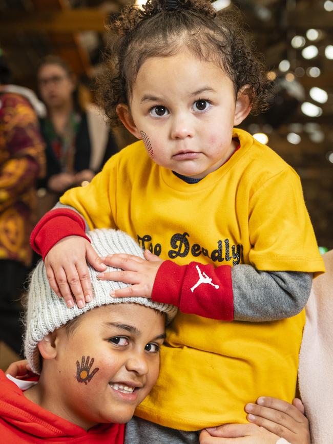 Isla-Grace Bartlett checks out the face paint on her brother Saxon Bartlett at the Toowoomba NAIDOC Week celebrations at The Goods Shed, Monday, July 4, 2022. Picture: Kevin Farmer