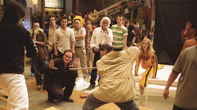 Uma Thurman with Quentin Tarantino on the set of Kill Bill: Volume 1.