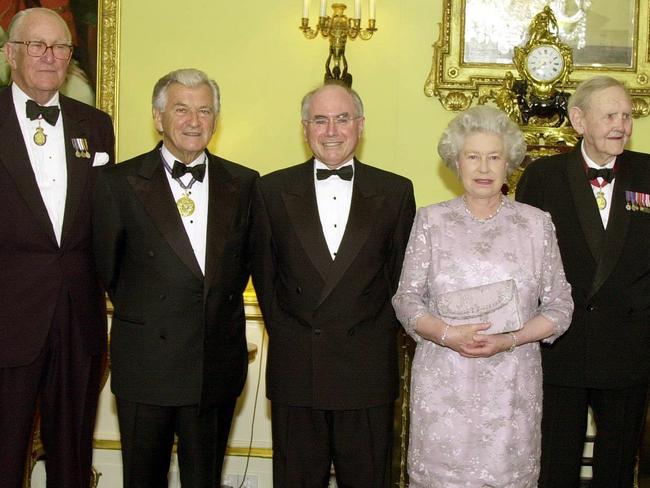 Queen Elizabeth with present and former Australian Prime Ministers, left to right, Malcolm Fraser, Bob Hawke, the present Prime Minister John Howard, John Gorton and Gough Whitlam, before a dinner at Buckingham Palace in London to commemorate the centenary of modern Australia. AP PHOTO