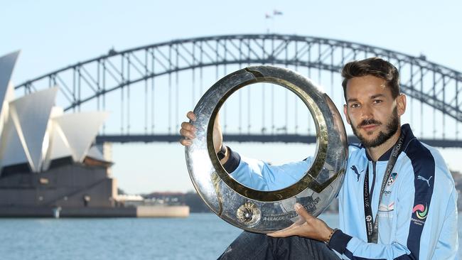Milos Ninkovic with the A-League trophy.