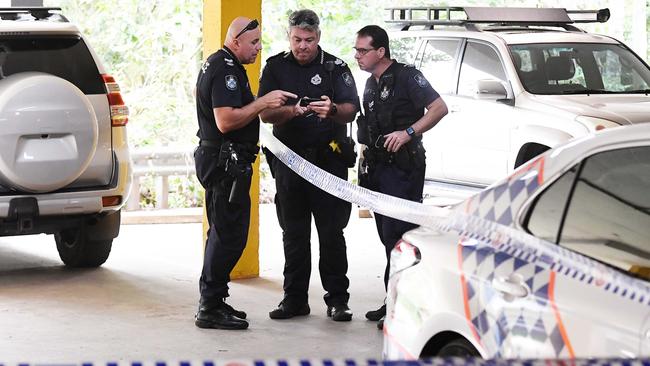 Police establish a crime scene in the car park under Super Cheap Auto after a man was stabbed in Nambour. Picture: Patrick Woods.