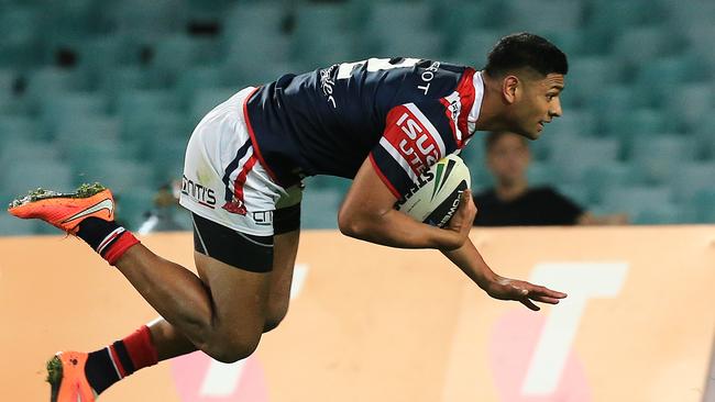 Daniel Tupou scores a try.