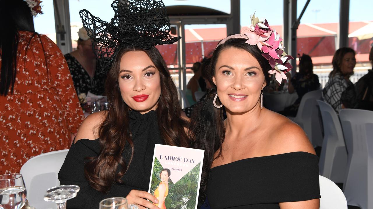 Olivia Griffiths and Amanda Hennessy at the Darwin Turf Club Bridge Toyota Ladies' Day / Derby Day. Picture: KATRINA BRIDGEFORD