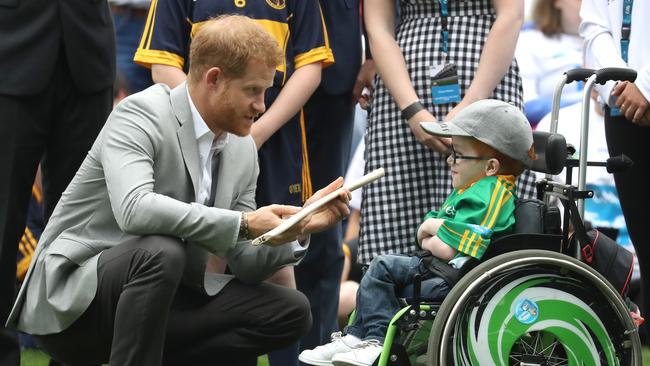 Harry chats with a young fan. Picture: Chris Jackson/Pool/Getty Images