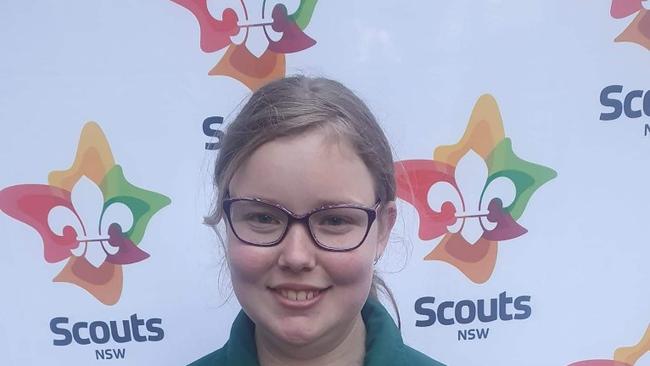 Jacinta showing off a Scouts award