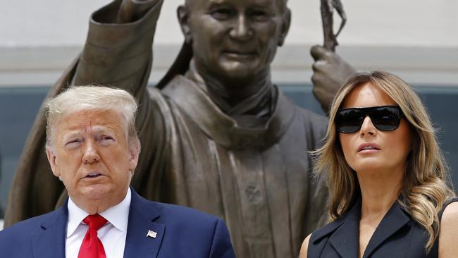 Donald and Melania Trump visit St John Paul II National Shrine in Washington. Picture: AP