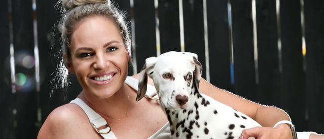 Emily Seebohm and her dog Pongo at home.                       Picture: NIGEL HALLETT