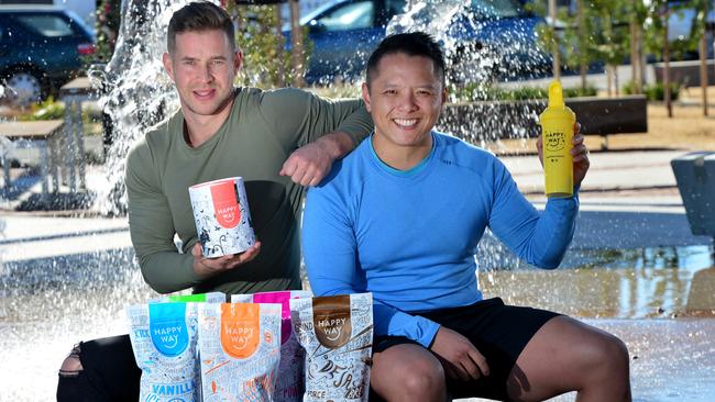 Happy Way co-founders Ben Germein and Hien Nguyen with their natural protein powders. Picture Mark Brake